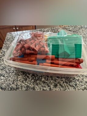 Container of Lincoln logs